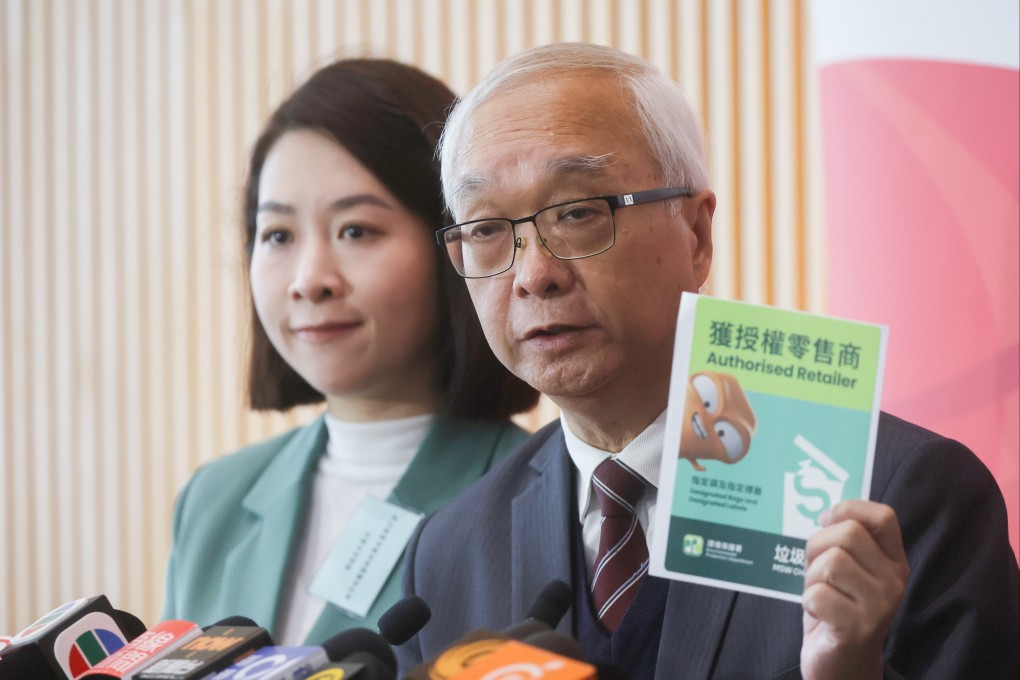 Kwai Tsing District Council member Jody Kwok Fu-yung (left) and Secretary for Environment and Ecology Tse Chin-wan meet the media after a briefing on municipal solid waste charging, at the government headquarters in Tamar on January 26. Tse has explained that the waste charging scheme is not about the money, but the way residents dispose of their rubbish. Photo: Edmond So