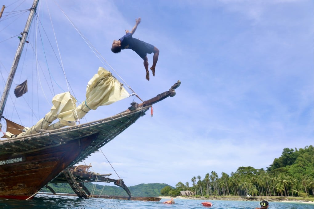 A voyage around the islands of Palawan on a traditional Filipino outrigger sailing boat includes reef swimming, dining on fresh fish and sea urchin, fun and games, and overnight stays at beach hideaways. Photo: Jordan Winters