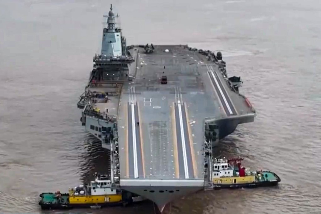 The Fujian was shown being towed by tugboats in a report on state television on January 2. Photo: CCTV