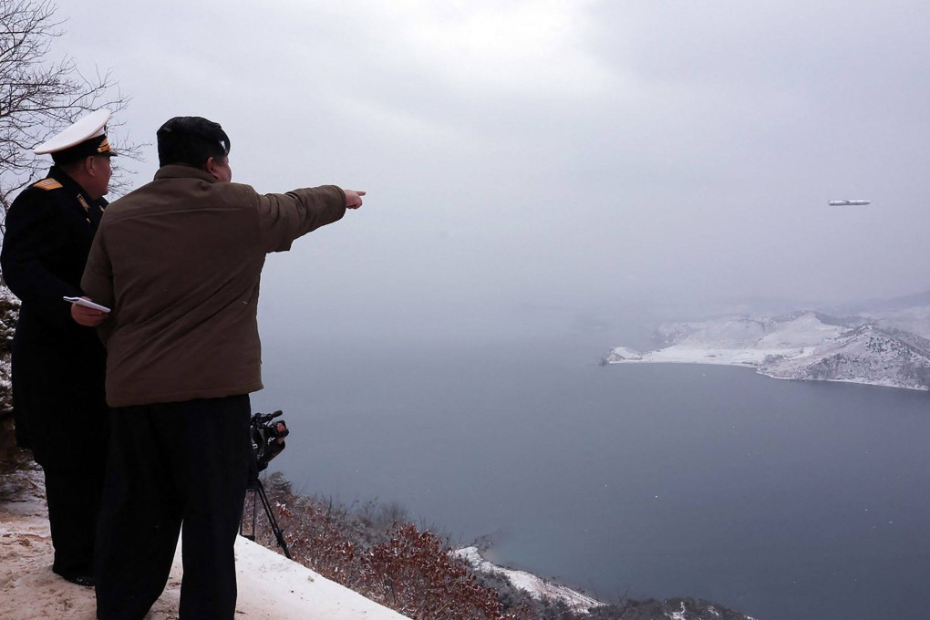 North Korean leader Kim Jong-un watches the test-firing of a submarine-launched strategic cruise missile, codenamed “Pulhwasal-3-31”, in this image released by state media. Photo: KCNA via KNS/AFP