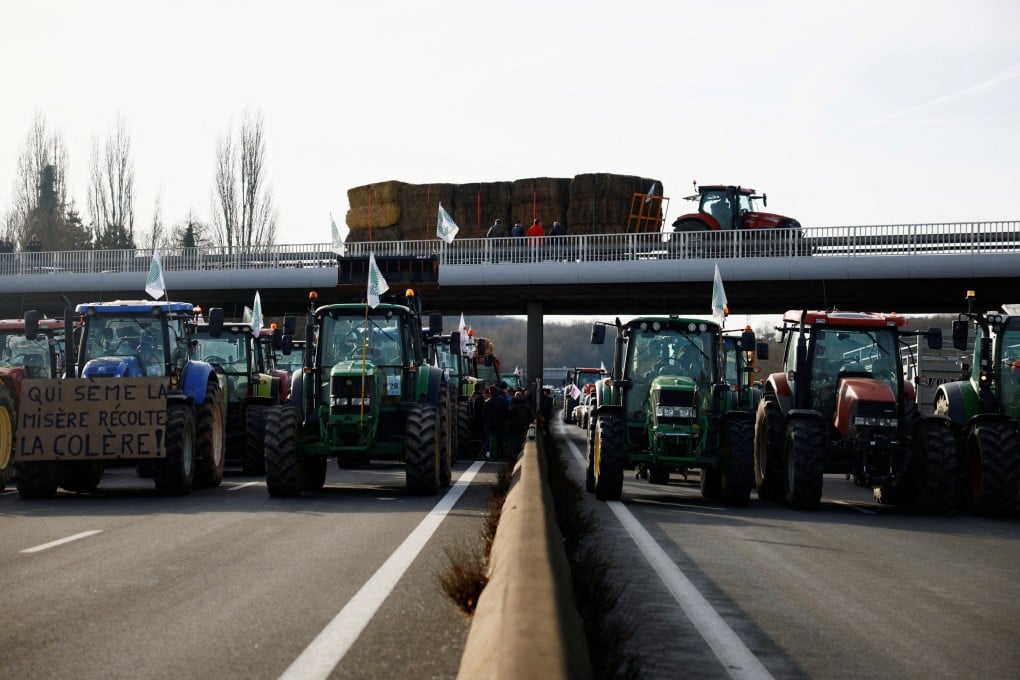 French farmers block a highway with their tractors in Longvilliers, near Paris. Photo: Reuters