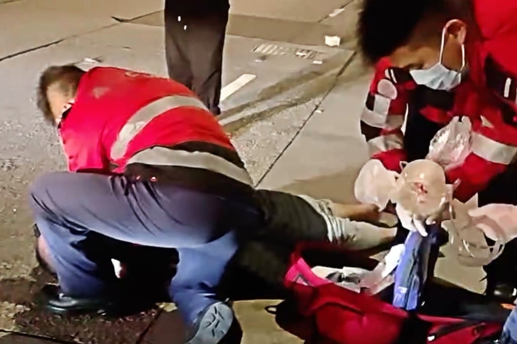 Emergency services personnel treat the victim. The 65-year-old man suffered head injuries and remained in critical condition as of Tuesday afternoon. Photo: Facebook/Jo K Er