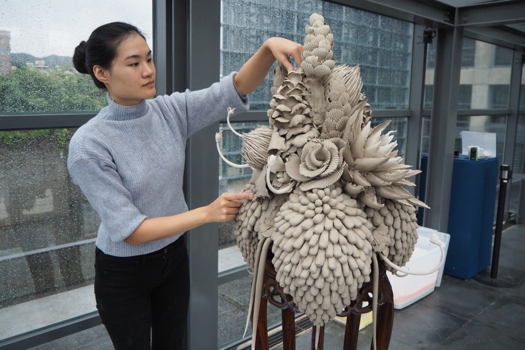Taiwanese-Australian ceramicist Ruth Ju-shih Li installs an ephemeral clay artwork at the New Taipei City Yingge Ceramics Museum, in Taiwan, in 2019. Photo: Tzu-Chun Fan