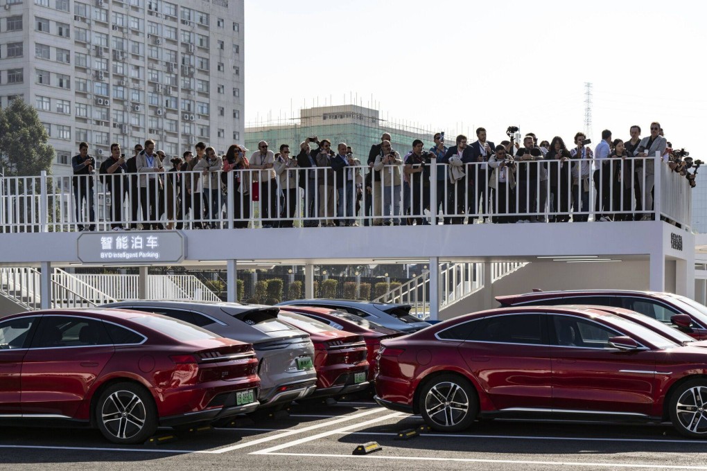 BYD electric vehicles perform a self-parking demonstration at the company’s headquarters in Shenzhen. Photo: Bloomberg