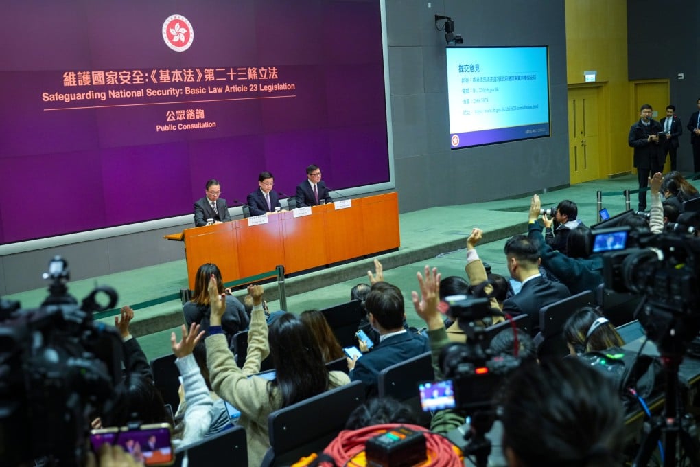 Officials meet the press to kick off public consultation on the coming security law. Photo: Sam Tsang
