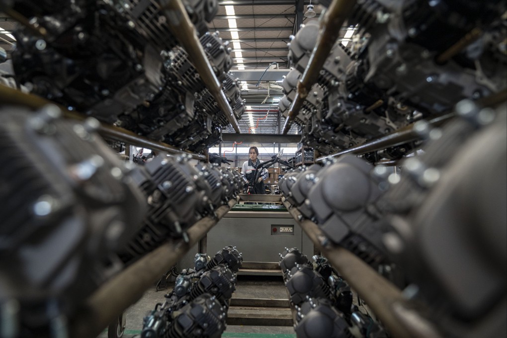 A woman works at a motorbike factory in the China (Yunnan) Pilot Free Trade Zone in Dehong in southwest China’s Yunnan province in November 2019. Photo: Xinhua