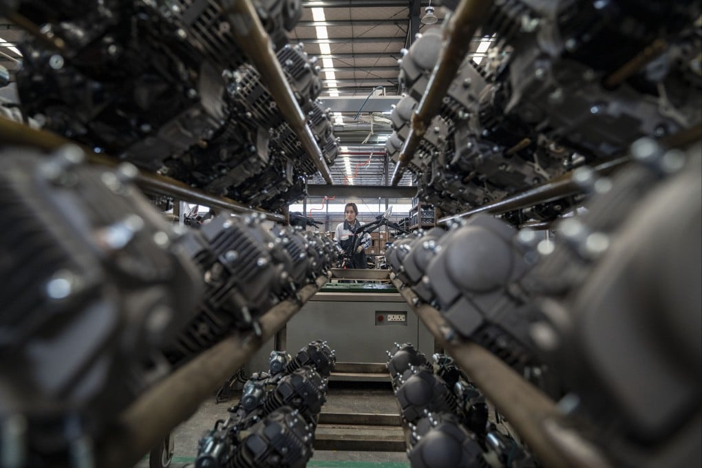 A woman works at a motorbike factory in the China (Yunnan) Pilot Free Trade Zone in Dehong in southwest China’s Yunnan province in November 2019. Photo: Xinhua