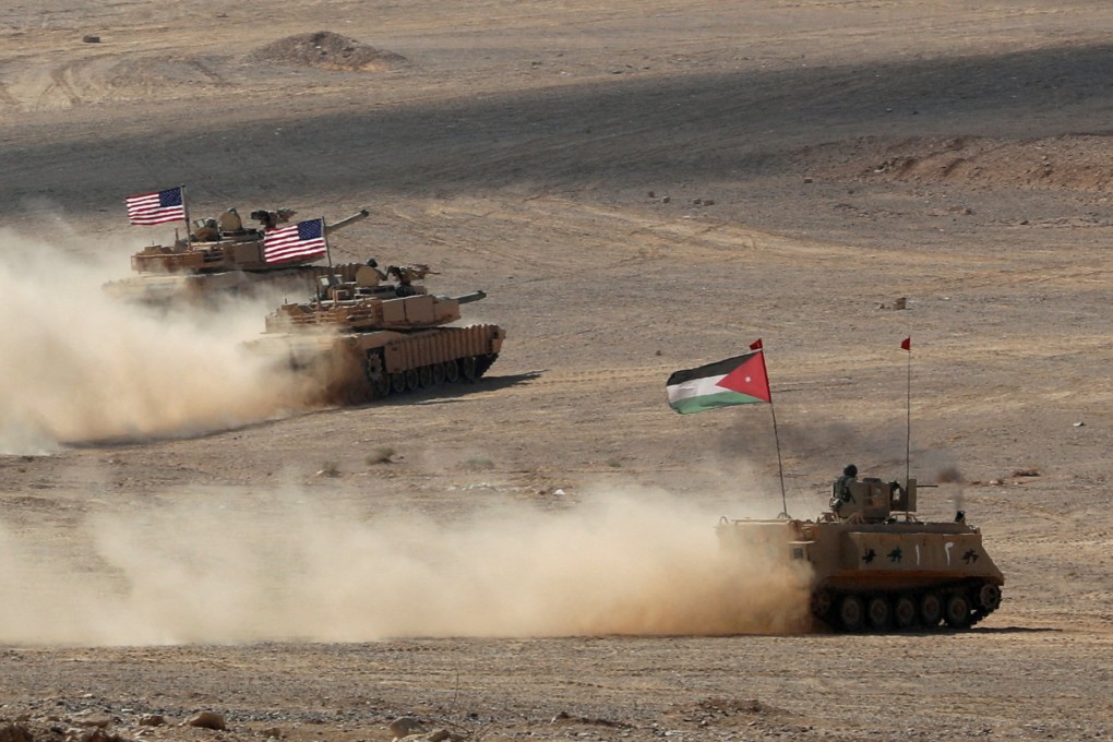 Military vehicles with Jordanian and US flags take part in military exercises, in Zarqa, Jordan on September 14, 2022. Photo: Reuters