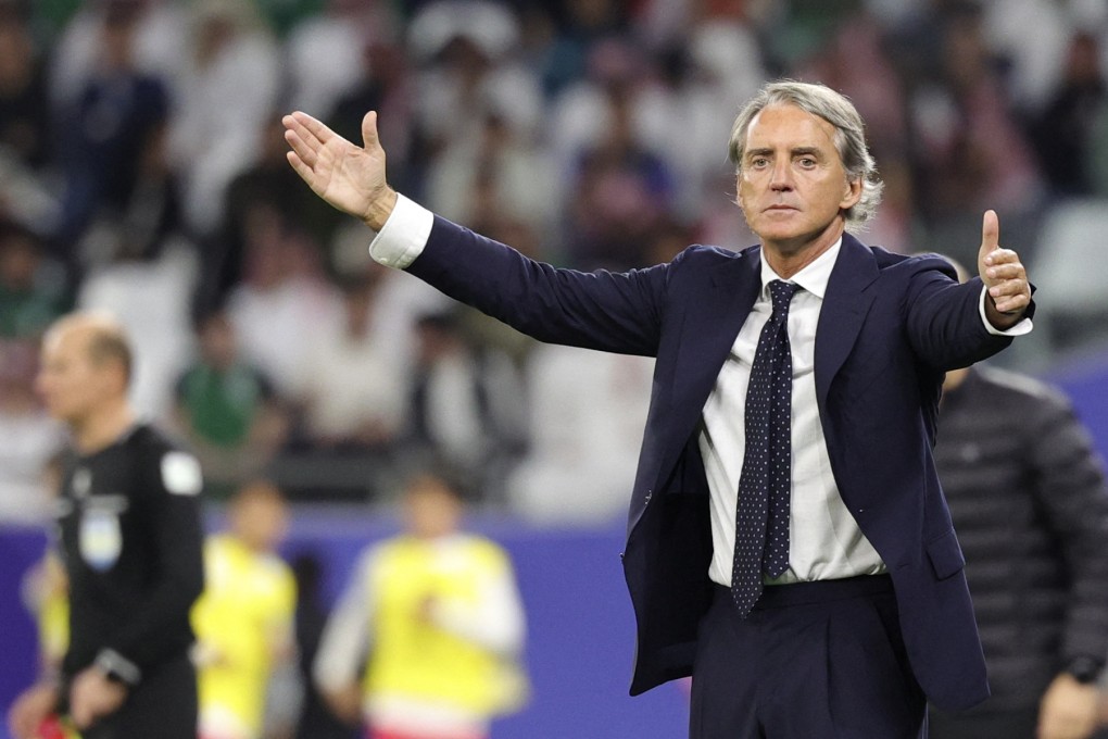 Saudi Arabia’s coach Roberto Mancini gestures to his players from the touchline during their game against South Korea. Photo: AFP
