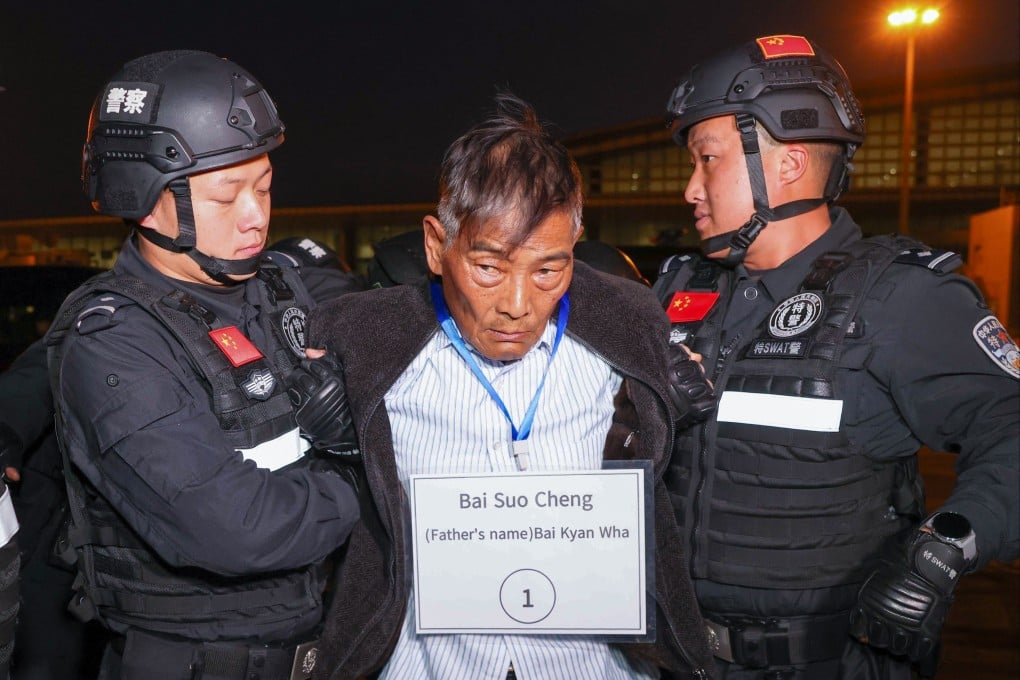 Suspected crime ring leader Bai Suocheng (centre) is handed over to Chinese police at the Naypyidaw International Airport in Myanmar’s capital on Tuesday. Photo: Xinhua