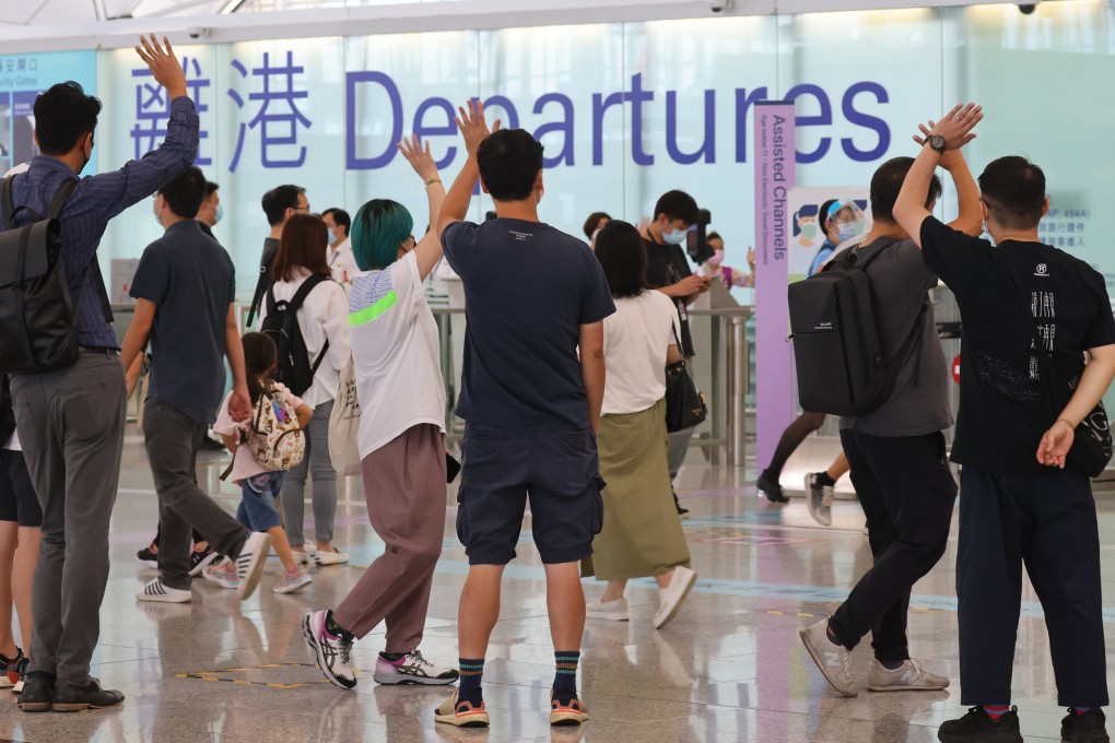 Family, relatives and friends bid farewell to their loved ones leaving the city in 2021.  Before the emigration wave,  less than 40 per cent of educators withdrew their retirement funds due to resignation. Photo: Dickson Lee