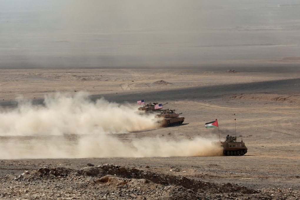 Armoured vehicles with Jordanian and US flags take part in a military exercise in Zarqa, Jordan in September 2022. Photo: Reuters