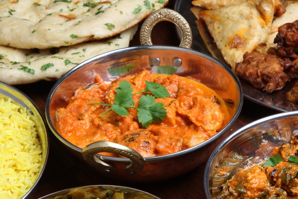 Butter chicken was invented by adding cooked chicken pieces to a gravy with tomatoes, butter, cream and spices. Photo: Getty Images/iStockphoto