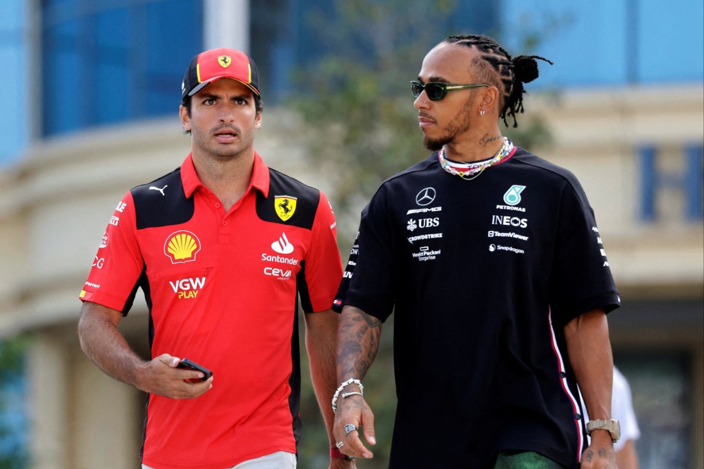 Ferrari’s Carlos Sainz Jr. and Mercedes’ Lewis Hamilton walk together ahead of the Azerbaijan Grand Prix in April, 2023. Photo: Reuters