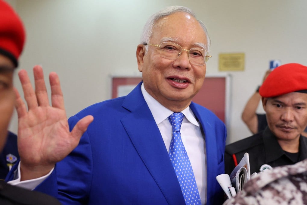 Former Malaysian Prime Minister Najib Razak waves as he leaves court in Kuala Lumpur last month. Photo: Reuters