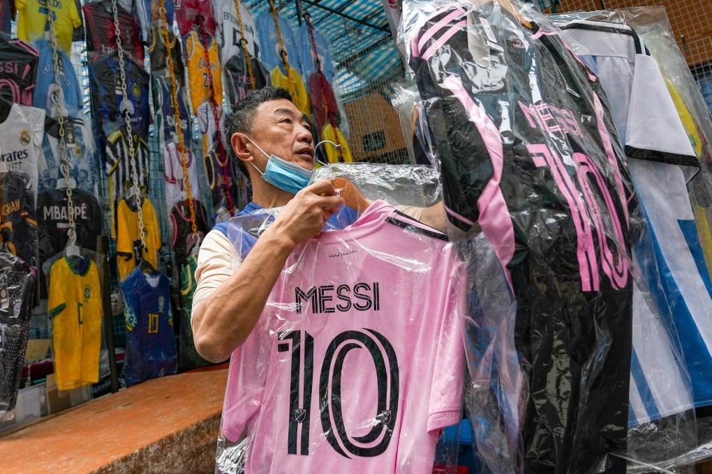 A store in Mong Kok sells Lionel Messi’s jerseys. Sportswear retailers in the city have seen customers flocking to their stores in search of the World Cup winner’s jerseys. Photo: Eugene Lee