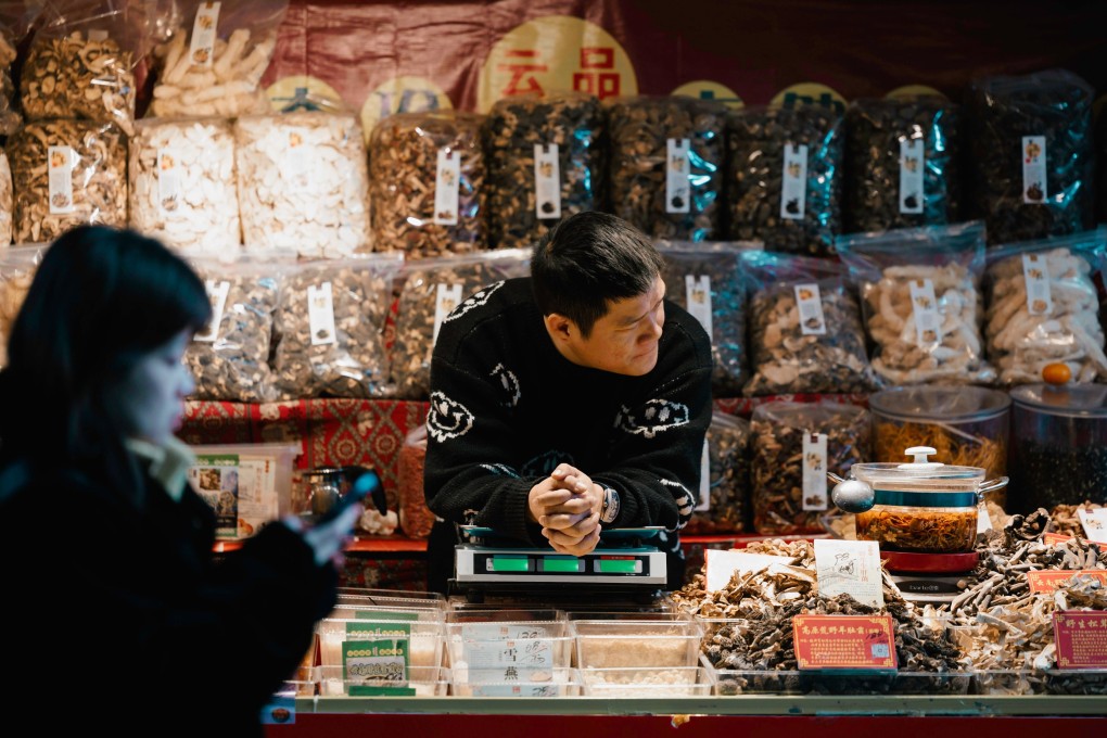 For China’s small and micro-sized businesses, mounting arrears could be “a domino that knocks over the others”, a new report warns. Photo: EPA-EFE