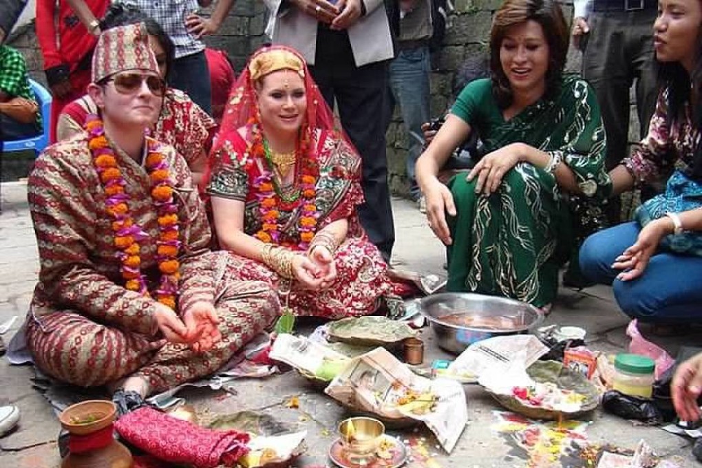 Courtney Welton-Mitchell and Sarah Welton-Mitchell during their Hindu wedding ceremony at a temple in Kathmandu in 2011. Photo: Courtney Welton-Mitchell.
