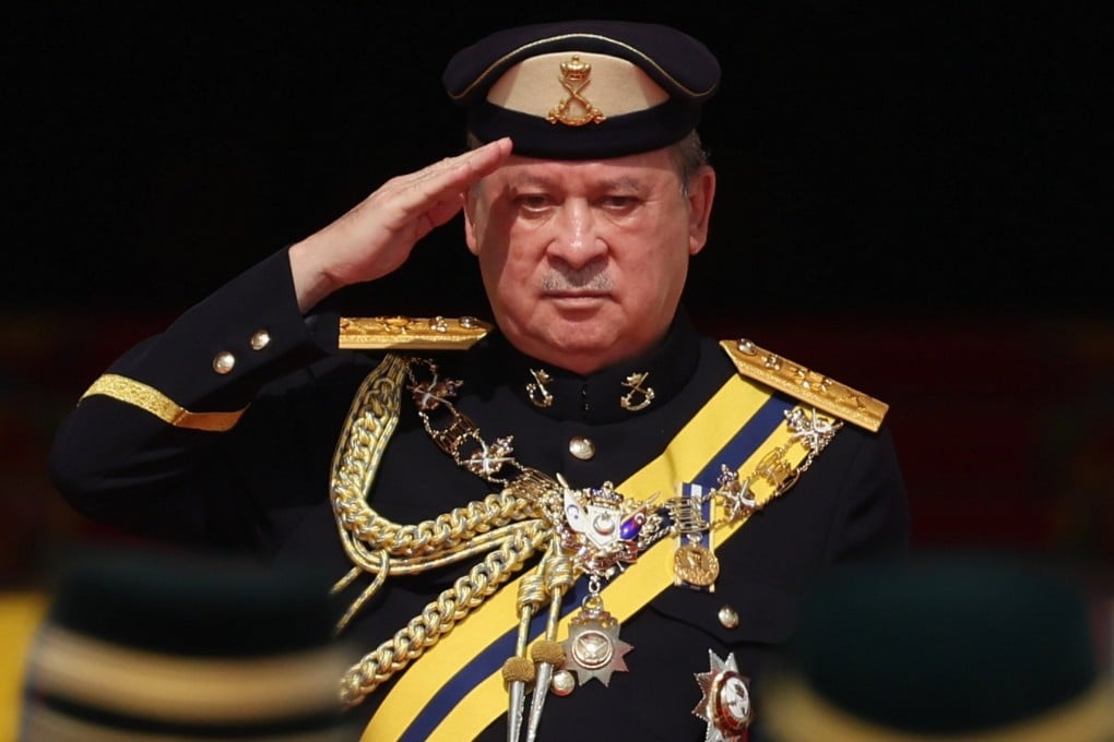 Sultan Ibrahim Sultan Iskandar salutes the guard of honour at the National Palace in Kuala Lumpur on Wednesday, during a ceremony in which he was installed as Malaysia’s 17th king. Photo: EPA-EFE