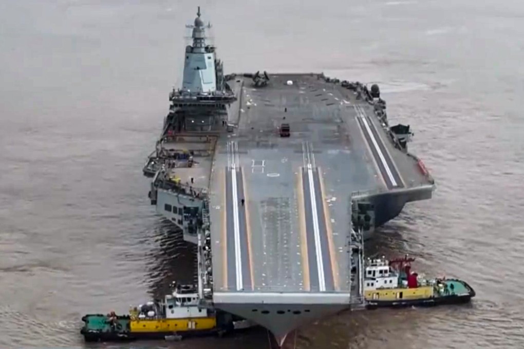 The Fujian was shown being towed by tugboats in a report on state television on January 2. Photo: CCTV