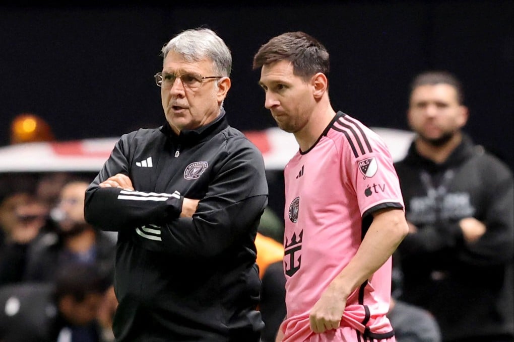 Inter Miami’s Argentine coach Gerardo Martino talks to Lionel Messi before the latter eventually enters the fray in Riyadh. Photo: AFP