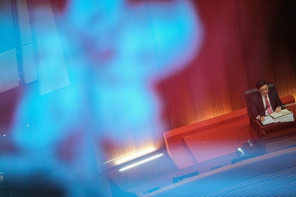 Hong Kong Chief Executive John Lee attends a question and answer session on the legislation for Article 23, at the Legislative Council in Hong Kong on January 25. Technological and geopolitical changes over the past 20 years have forced many jurisdictions to enact or update their national security laws to counter new threats. Photo: Reuters