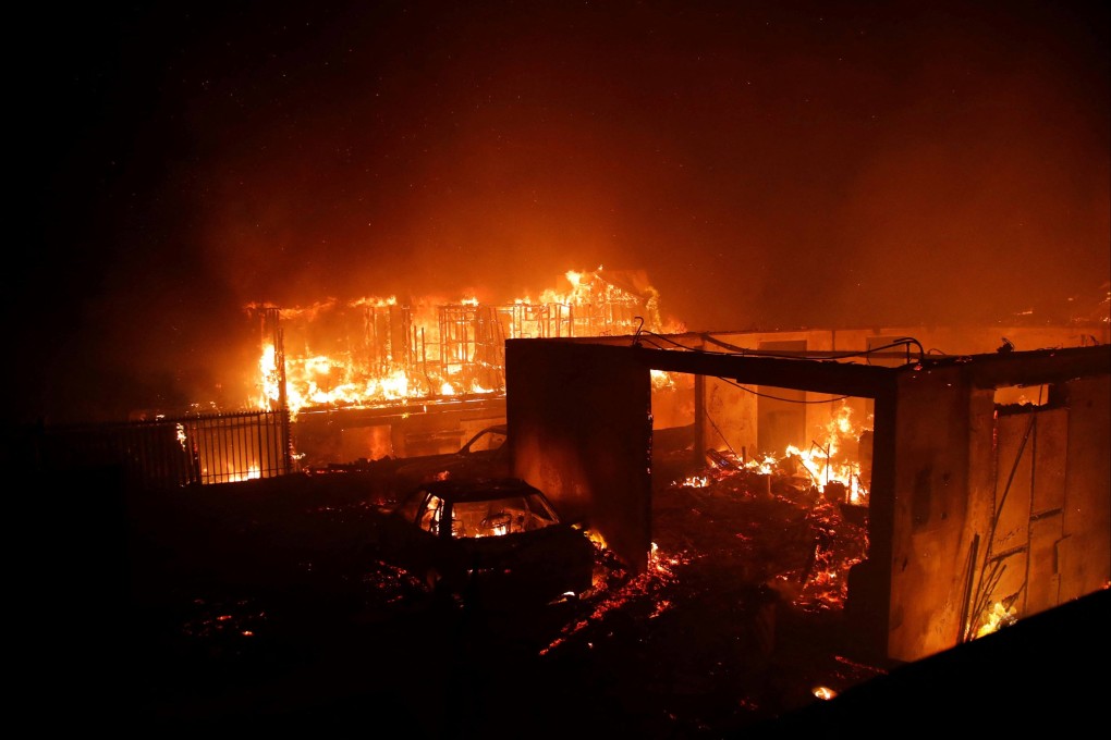Vehicles and homes burn in Vina del Mar, Chile, on Friday. Photo: AFP