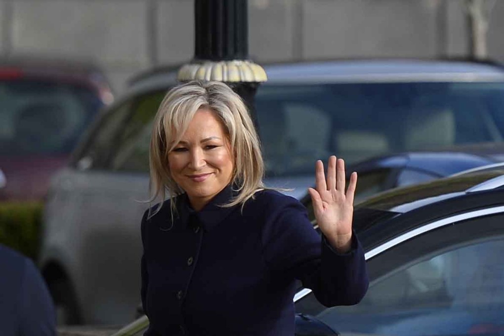 Sinn Fein leader Michelle O’Neill waves as she arrives at the Stormont Buildings ahead of a special sitting of the Assembly in Belfast, Northern Ireland, on Saturday. Photo: EPA-EFE