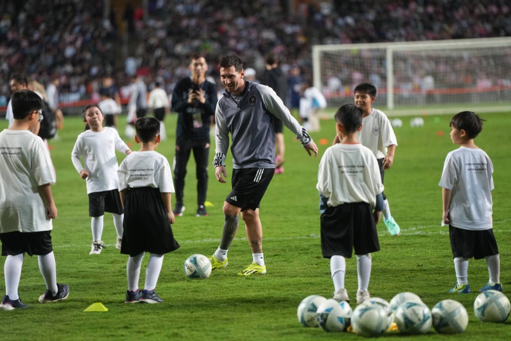 Lionel Messi takes part in a coaching clinic with some local children at Hong Kong Stadium. Photo: Sam Tsang