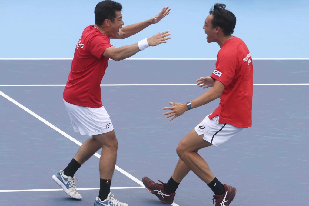 Hong Kong’s Kevin Wong (left) and Coleman Wong celebrate as their doubles win seals overall victory in the tie. Photo: Yik Yeung-man