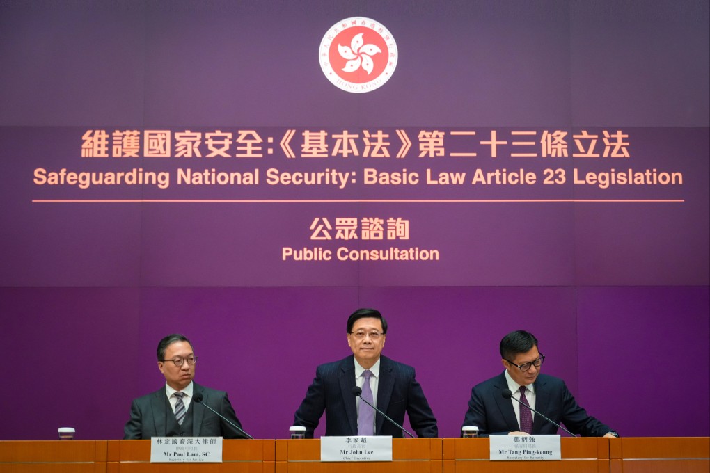 (From left) Secretary for Justice Paul Lam, Chief Executive John Lee Ka-chiu and Secretary for Security Chris Tang attend a press conference on the public consultation of the Article 23. Photo: Sam Tsang