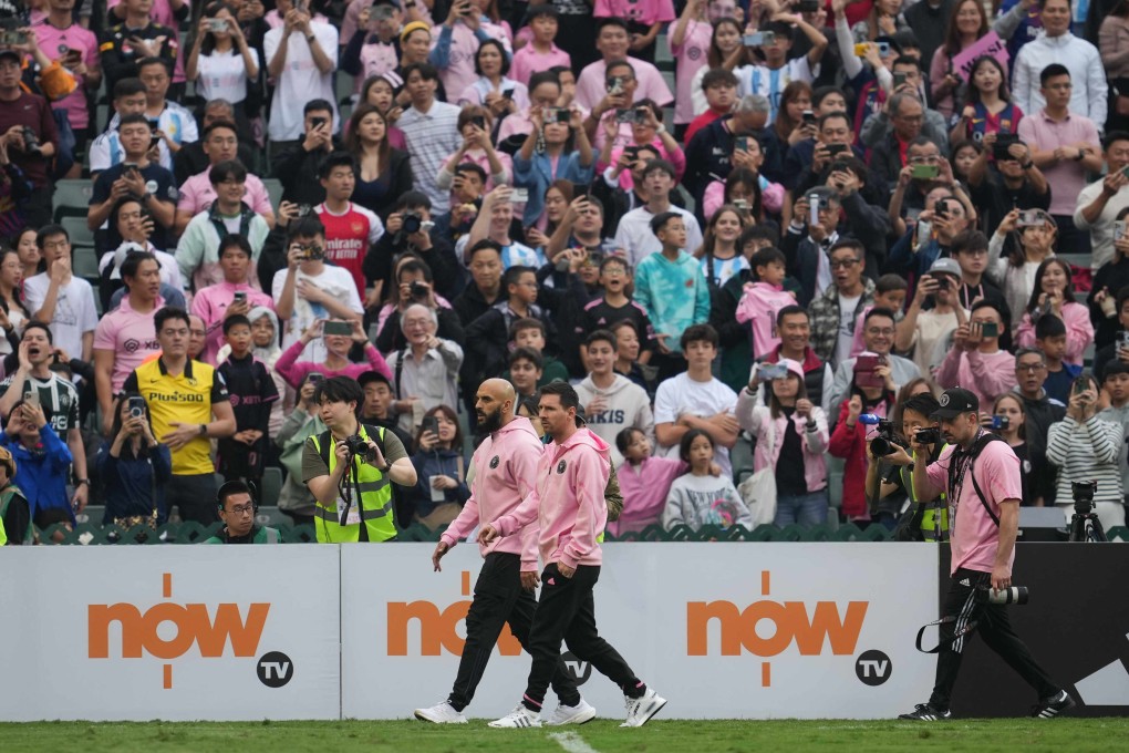 Inter Miami’s Lionel Messi (centre, right) walks the touchline with team mate Gonzalo Higuain during Sunday’s match with a Hong Kong select. Photo: Sam Tsang