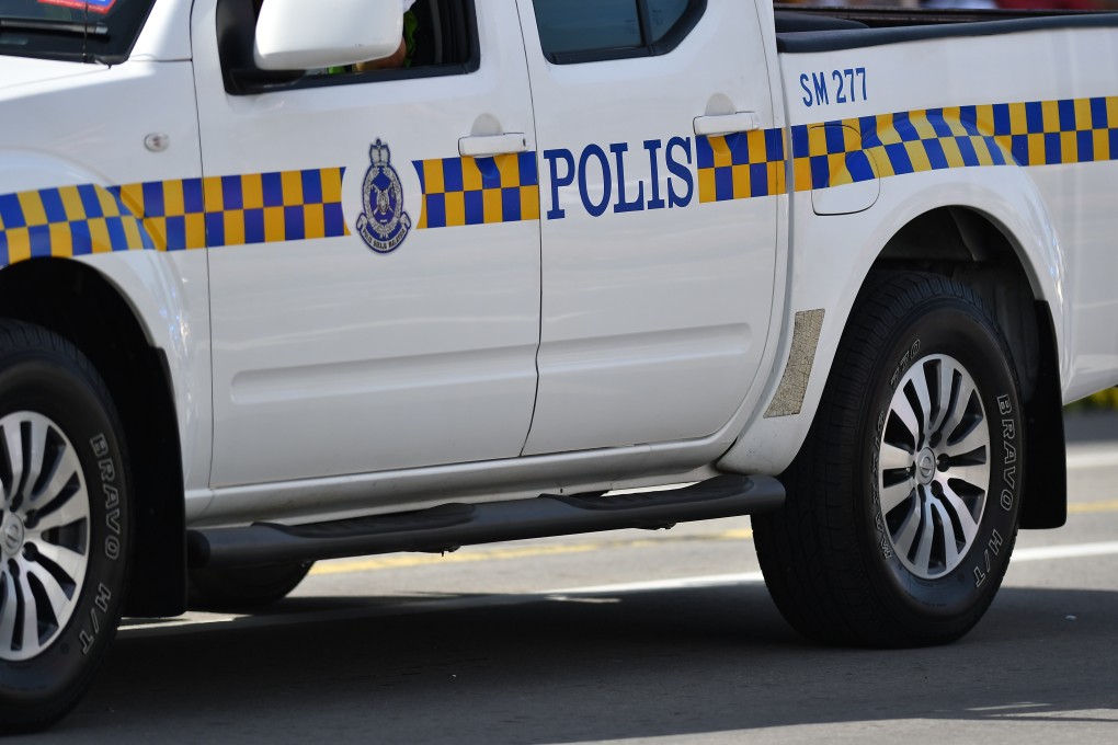 A Royal Malaysia Police vehicle in Sabah state. Initial investigations found that the couple were intoxicated when the argument got out of hand and the wife challenged the husband to set her on fire. Photo: Shutterstock