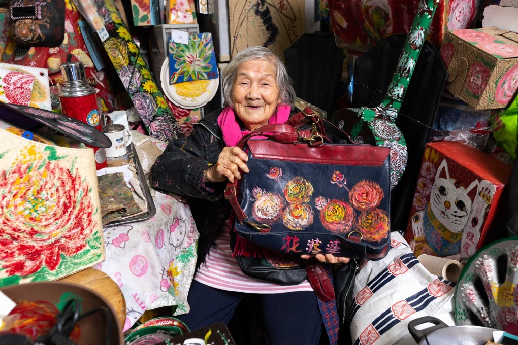Hong Kong artist Fapopo with some of her work at her home in Sai Kung in December 2022. Known as the “Flower Granny”, she is often compared with Japanese artist Yayoi Kusama. Photo: 13A New Street Art Gallery