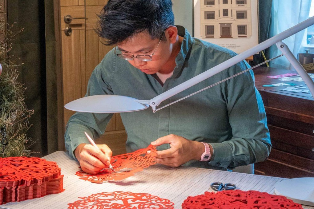 Nick Tsao, Hong Kong architect and paper cutter, at work on a design. Paper cutting has become a second career for him, on which he spends half his time. Tsao wants to bring contemporary design into traditional Chinese paper cutting. Photo: Instagram/@tsaoao and @tsaoao.design