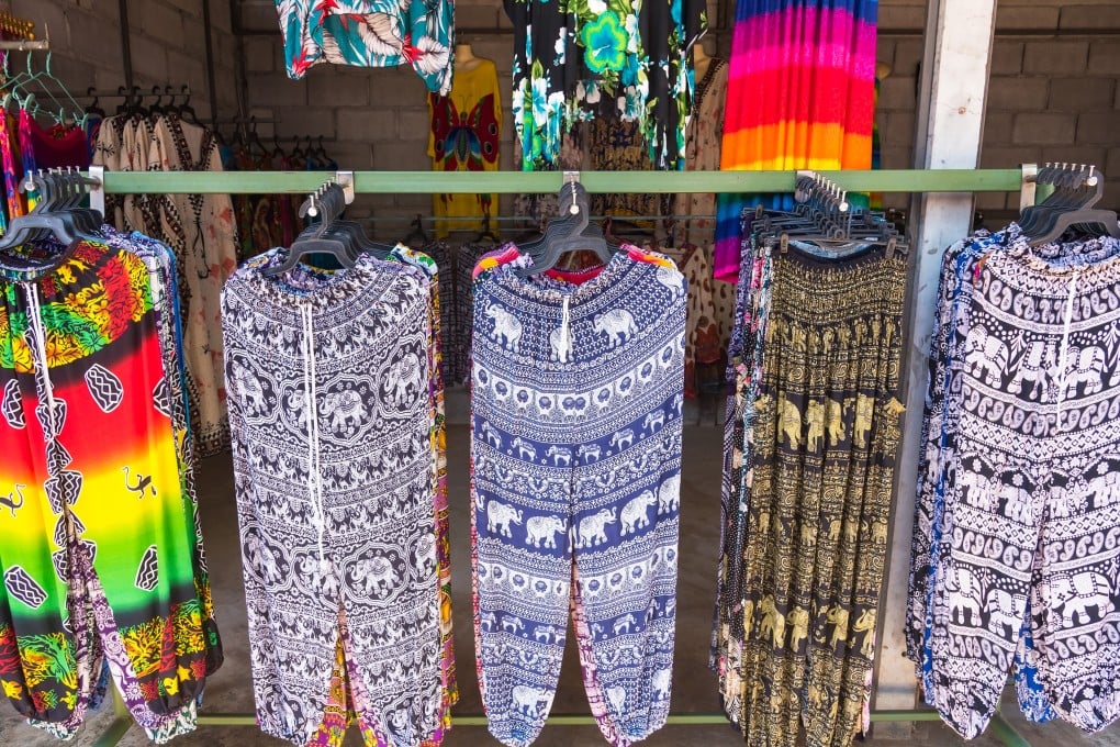 Pants with printed elephant patterns at a shop in Kanchanaburii, Thailand. Photo: Shutterstock
