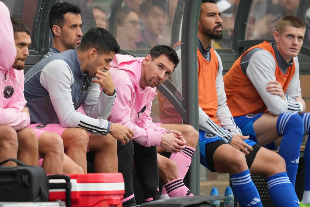 Lionel Messi sits on the bench during the match against Hong Kong. Photo: Sam Tsang
