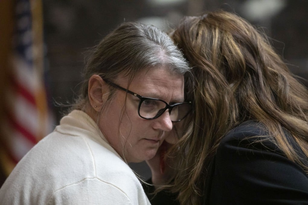 Jennifer Crumbley, the mother of Oxford school shooter Ethan Crumbley, speaks with her lawyer, Shannon Smith, in Oakland County Circuit Court on Tuesday. Photo: AFP