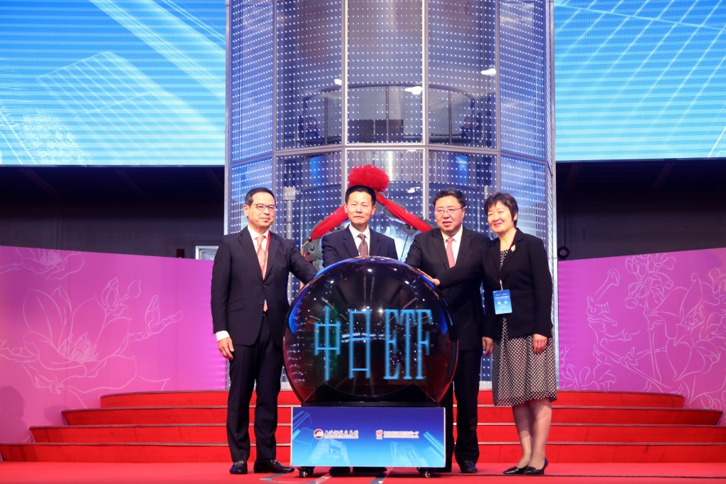 Wu Qing, second from left, has been appointed the new chairman and party secretary for China’s securities regulator. Photo: Handout