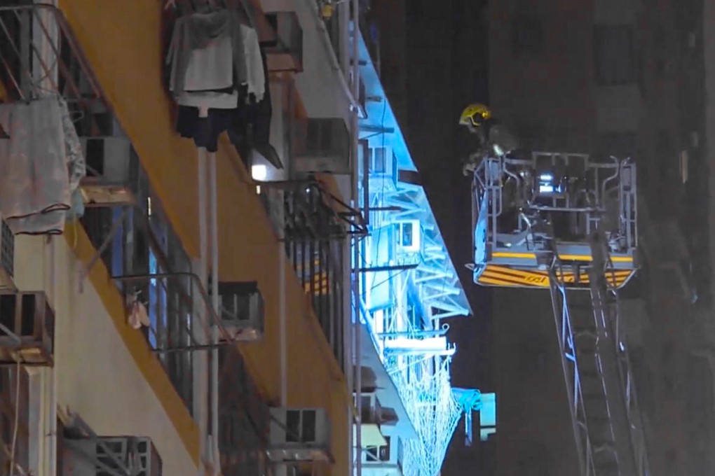 A screengrab of footage showing firefighters at the scene of the blaze in Tsuen Wan district. Photo: Cable TV News