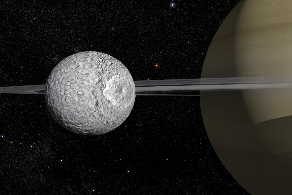 A team of researchers from China and Europe have found a young and evolving body of water beneath the surface of Mimas, the smallest moon in orbit around Saturn. Image: Observatoire de Paris