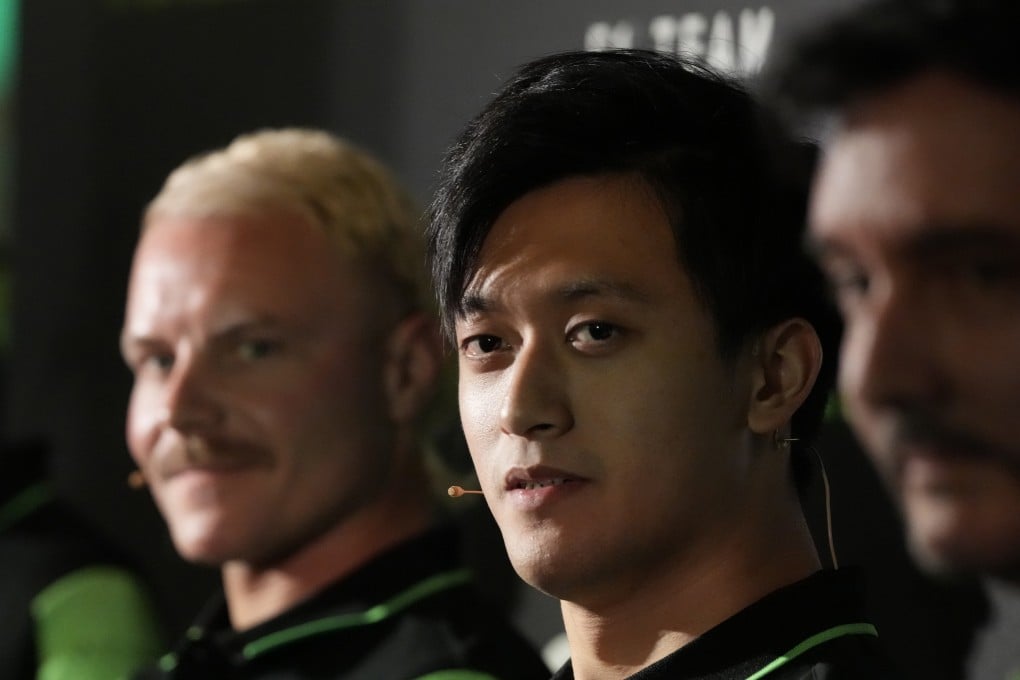 Zhou Guanyu listens to a question from the media as he attends the launch of the Sauber C44 car in London. Photo: AP