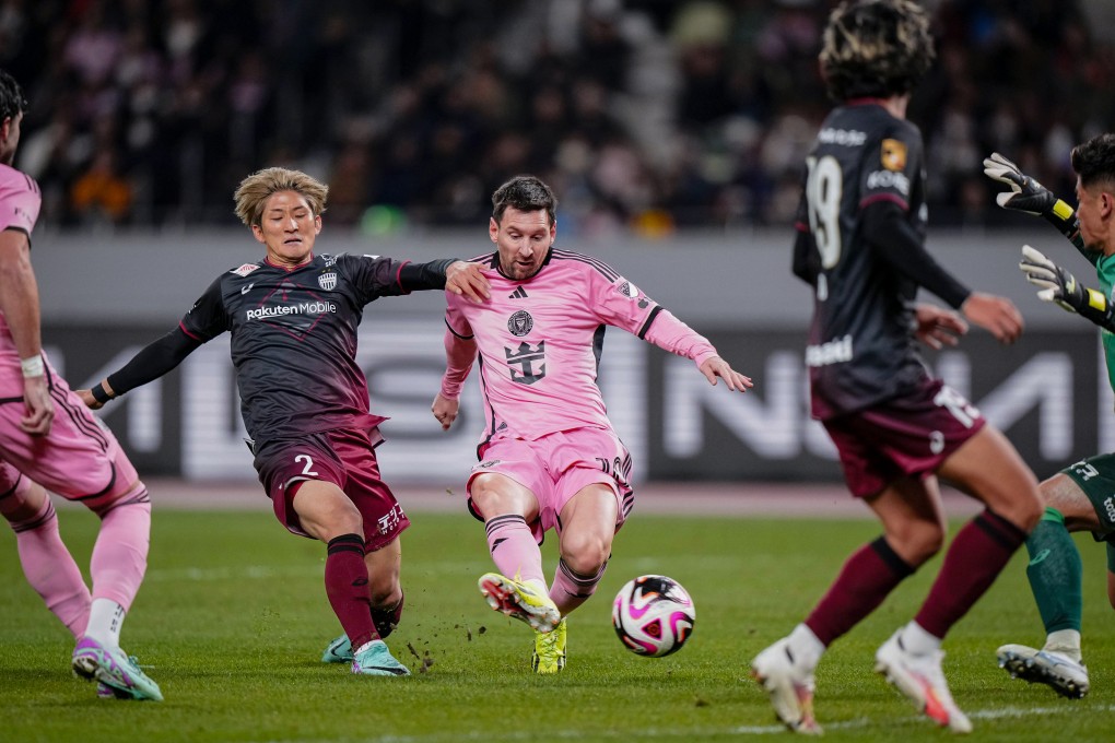 Inter Miami’s Lionel Messi (center) takes a shot against Vissel Kobe. Messi played in Japan but remained on the bench for the whole game in Hong Kong. Photo: Kyodo