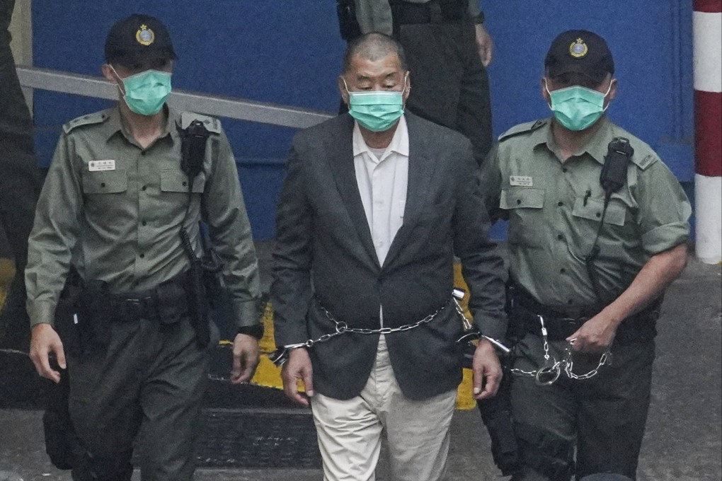 Apple Daily founder Jimmy Lai (centre) in 2020. Lai’s trial entered its 26th day on Thursday with the court hearing how the media tycoon discussed possible US sanction targets in his 2019 commentaries. Photo: Winson Wong
