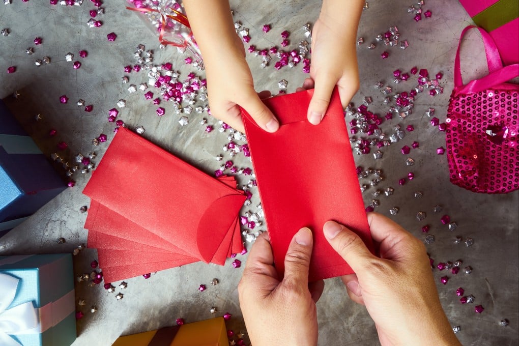 The Lunar New Year tradition of giving red packets (lai see in Cantonese) dates back centuries, and was originally meant to ward off evil spirits. Photo: Shutterstock Images