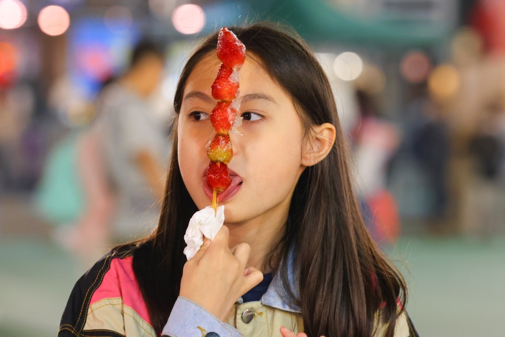 Hong Kong’s Lunar New Year Fair is back, offering a plethora of food, merchandise and traditional flowers at Victoria Park in Causeway Bay. Photo: Dickson Lee