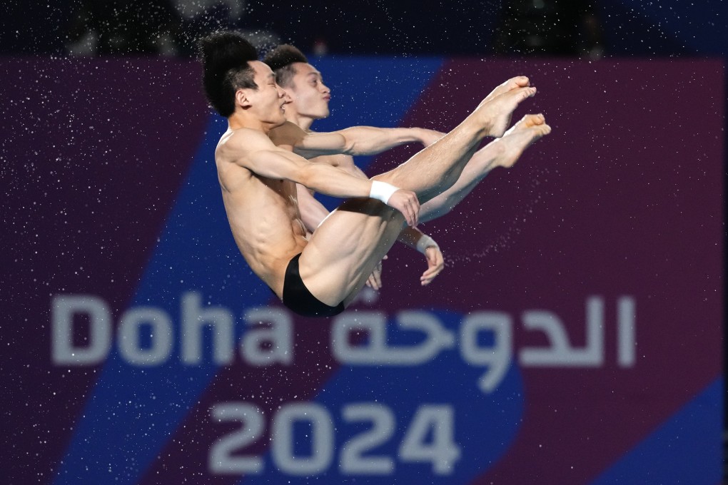 Lian Junjie and Yang Hao compete during the men’s synchronized 10m platform diving final at the World Aquatics Championships in Doha, Qatar. Photo: AP