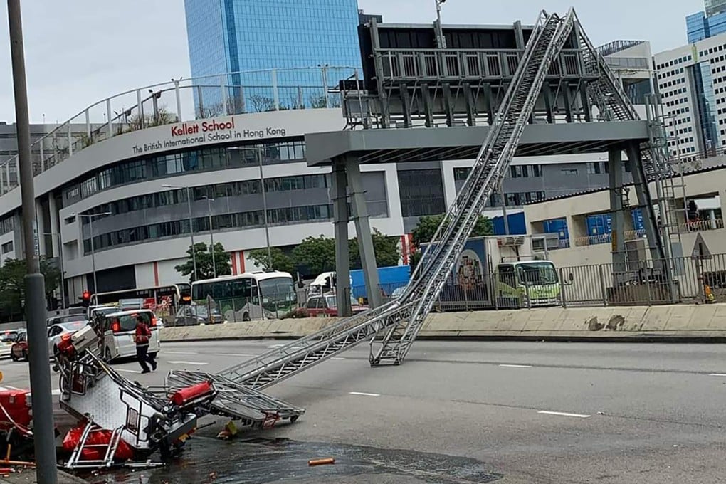 A 56-metre (184-foot) fire truck ladder collapsed on Friday blocking three lanes of Kai Cheung Road in Kowloon Bay on Friday. Photo: Handout