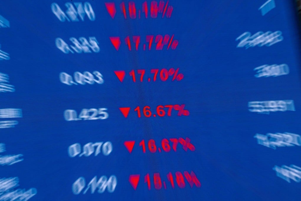 Falling stock figures displayed on a screen in Hong Kong on January 23, 2024. Photo: Bloomberg