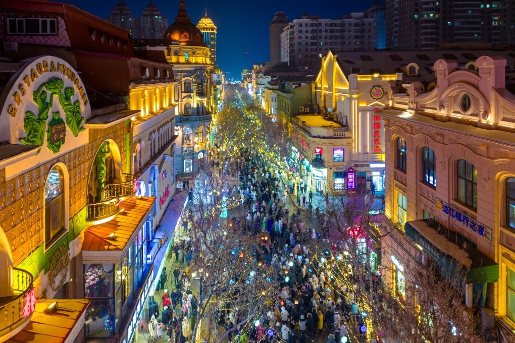 Tourists on Central Street in Harbin, the city in northeastern China that is experiencing record visitor numbers this winter. Photo: Xinhua